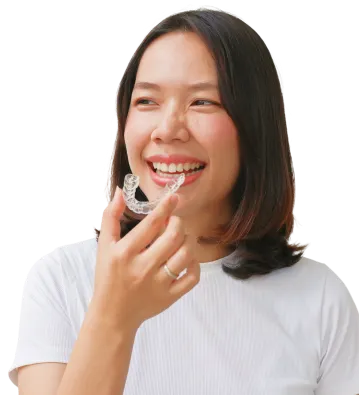 Patient with clear aligners smiling